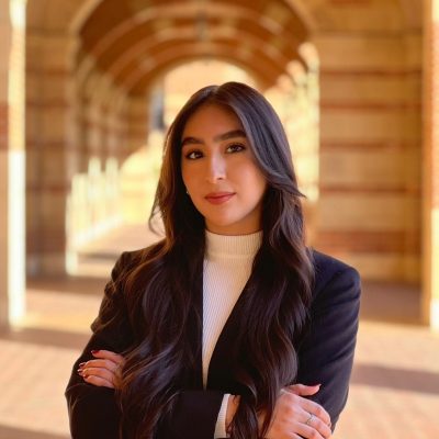Headshot of Daniela Salgado in a black suit.